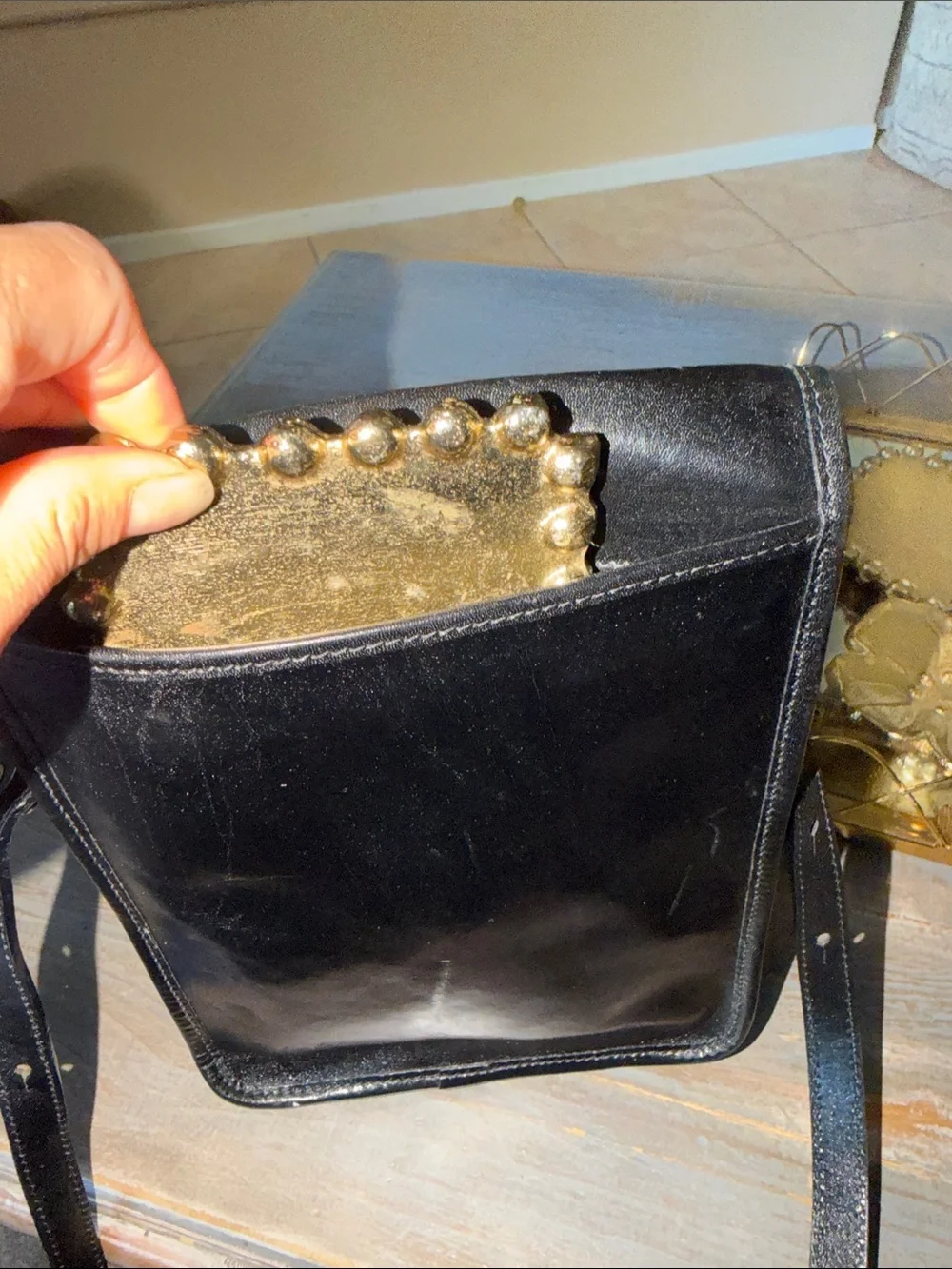Brahmin Black Leather Messenger Bag with Gold Medallion